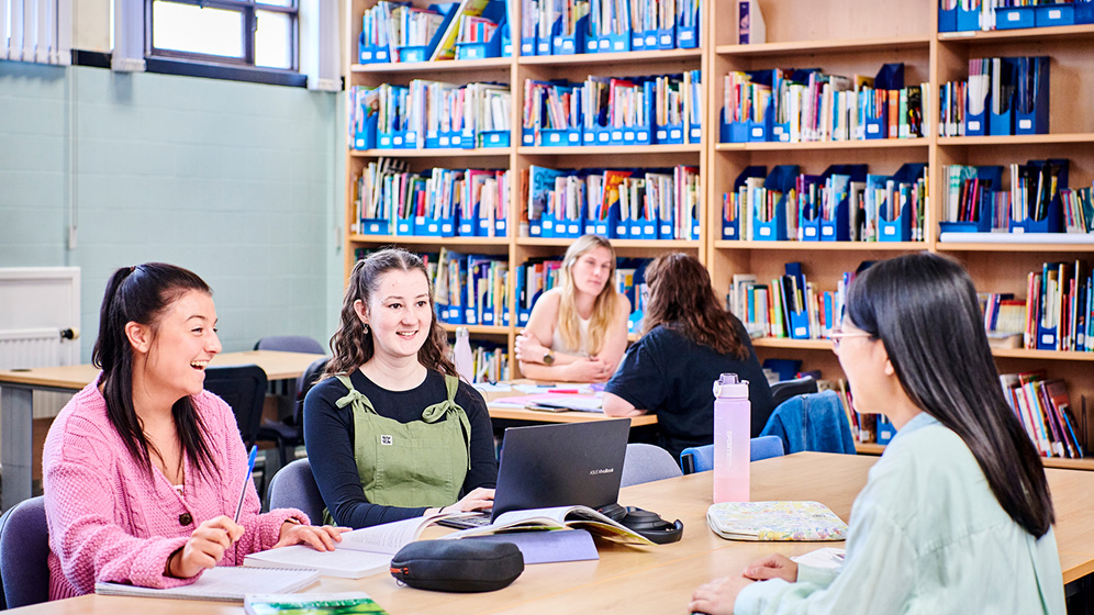 Student working in a library